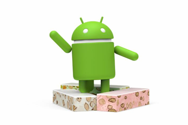 Android robot waving and standing on a pile of nougat 